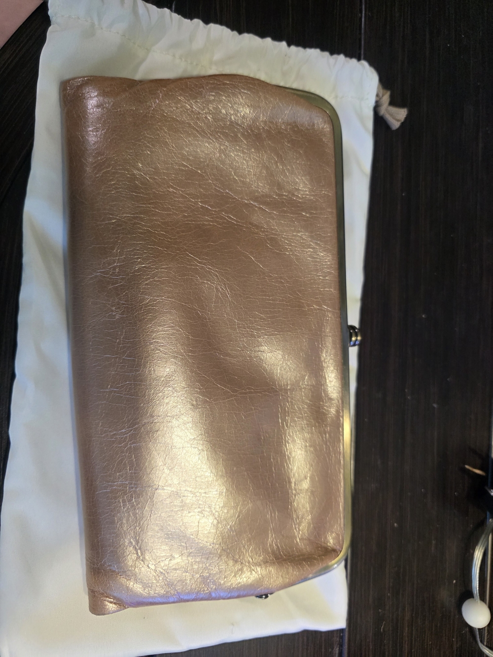 Metallic Rose Clutch Wallet Champagne Gold. Hobo International Lauren.
